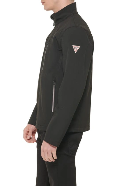 Shop Guess Stand Collar Softshell Rain Jacket In Black