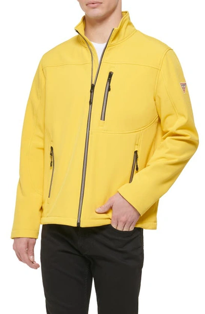 Shop Guess Stand Collar Softshell Rain Jacket In Sun
