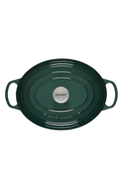 Shop Le Creuset Signature 6.75-quart Oval Enamel Cast Iron French/dutch Oven With Lid In Artichaut