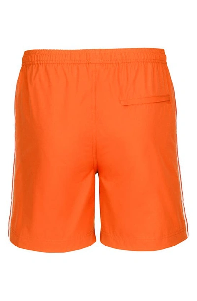 Shop Swims Saline Water Reactive Swim Trunks In  Orange