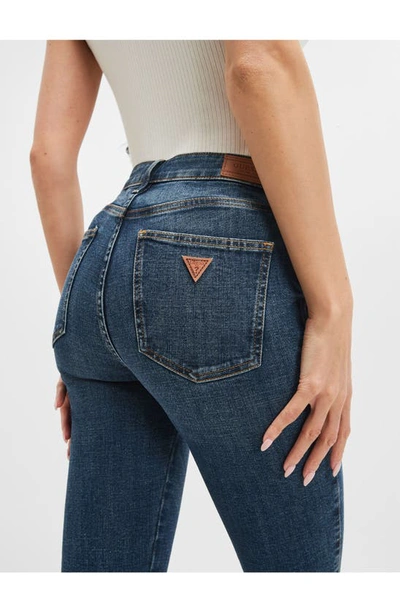 Shop Guess Sexy Flare High Waist Jeans In Blue Fog Wash