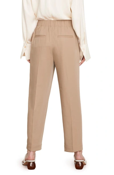 Shop Vince Tapered Pull-on Pants In Sandshell