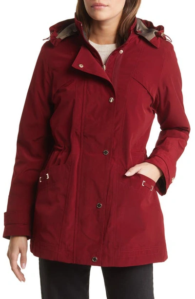 Gallery Cinched Waist Hooded Raincoat In Merlot