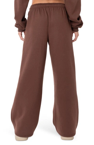 Shop Edikted Brenna Low Rise Wide Leg Sweatpants In Brown