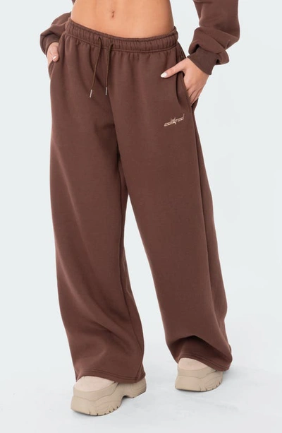 Shop Edikted Brenna Low Rise Wide Leg Sweatpants In Brown