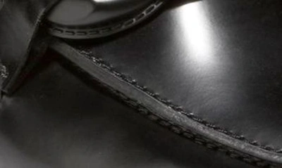 Shop Cole Haan Geneva Chain Loafer In Black Ltr