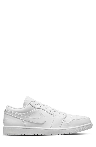 Shop Jordan Air  1 Low Sneaker In White