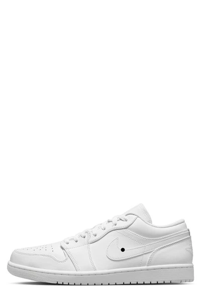 Shop Jordan Air  1 Low Sneaker In White