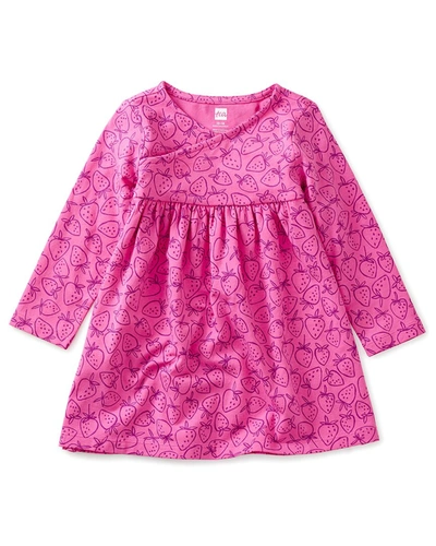 Shop Tea Collection Wrap Neck Baby Dress In Pink