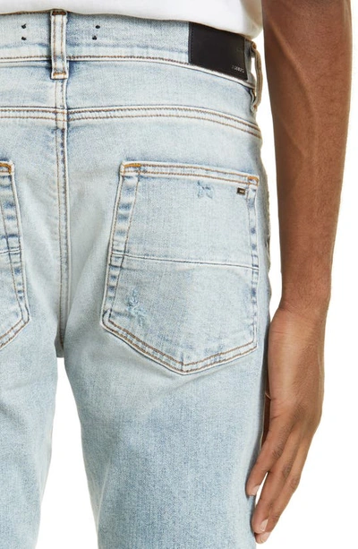 Amiri Stack Distressed Slim Fit Jeans In Stone Indigo