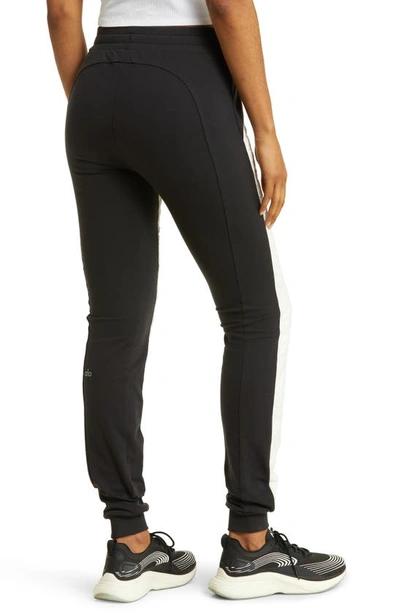 Shop Alo Yoga Warming Airbrush High-waist Puffer Pants In Black/ivory