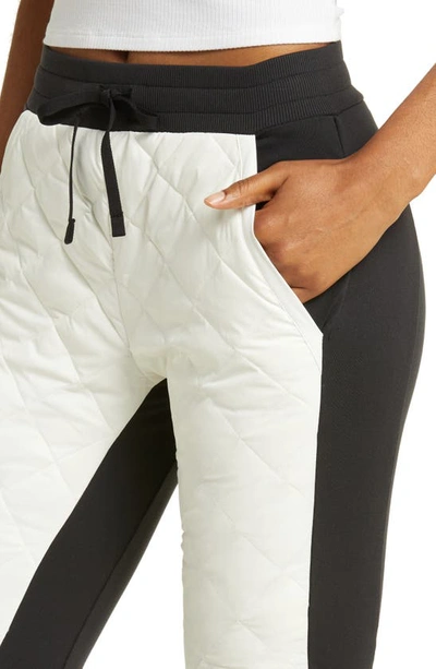 Shop Alo Yoga Alo Warming Airbrush High-waist Puffer Pants In Black/ivory