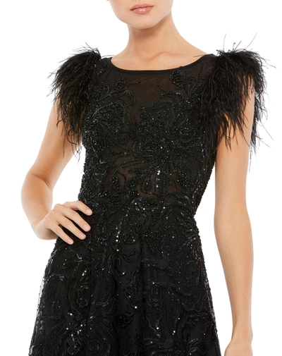 Shop Mac Duggal Embellished Feather Cap Sleeve Bateau A Line Gown In Black