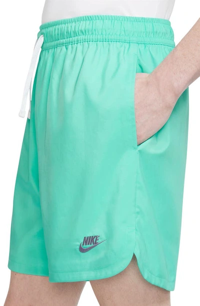 Shop Nike Woven Lined Flow Shorts In Light Menta/ Light Thistle