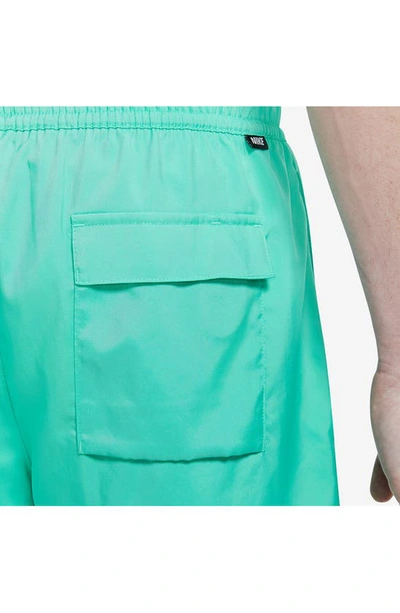 Shop Nike Woven Lined Flow Shorts In Light Menta/ Light Thistle