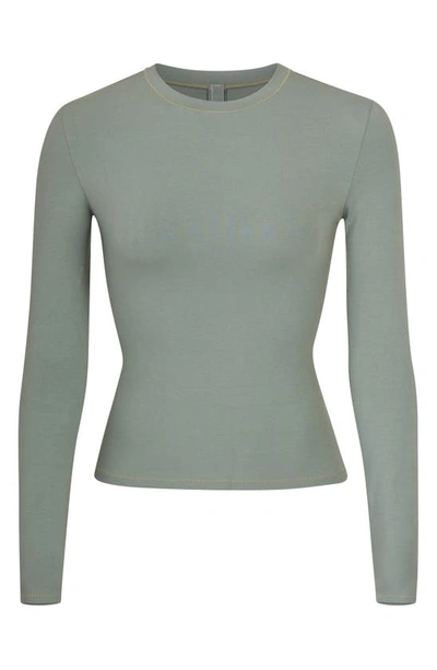 Shop Skims Stretch Cotton Jersey Long Sleeve T-shirt In Mineral