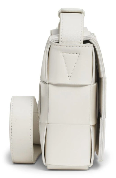 Shop Bottega Veneta Small Intrecciato Leather Cassette Crossbody Bag In 9009 White-gold