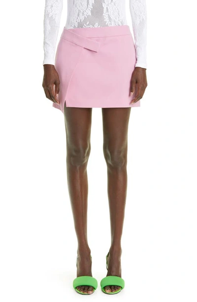 Shop Attico Cloe Asymmetric Stretch Virgin Wool Miniskirt In Mauve