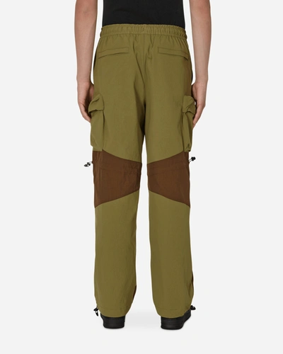 Shop Nike 23 Engineered Woven Pants Green In Multicolor