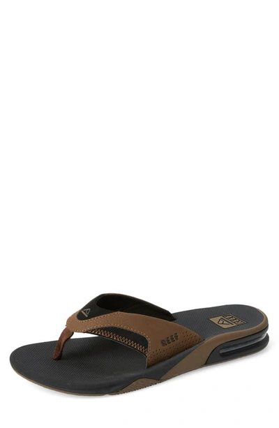 Shop Reef Fanning Low Flip Flop In Black And Tan