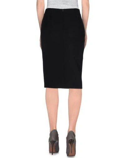 Shop Moschino Cheap & Chic Midi Skirts In Black