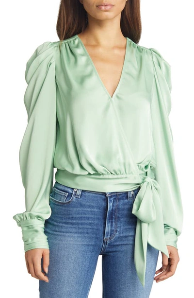 Shop Ramy Brook Pauline Satin Wrap Front Blouse In Pistachio