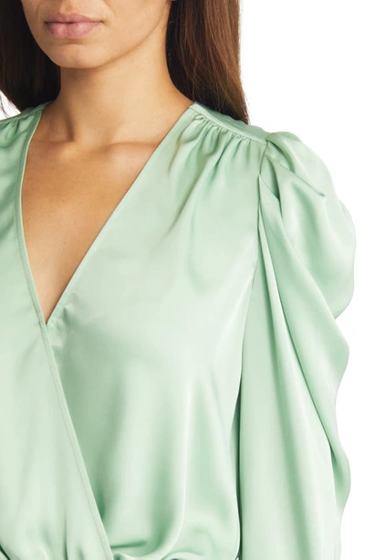 Shop Ramy Brook Pauline Satin Wrap Front Blouse In Pistachio