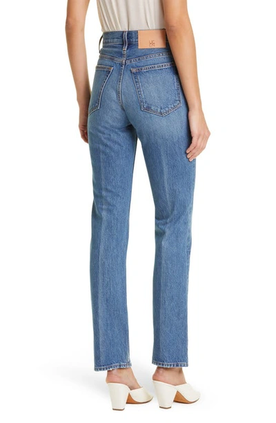 Shop Ulla Johnson The Agnes High Wait Rigid Bootcut Jeans In Danube Medium Indigo Wash