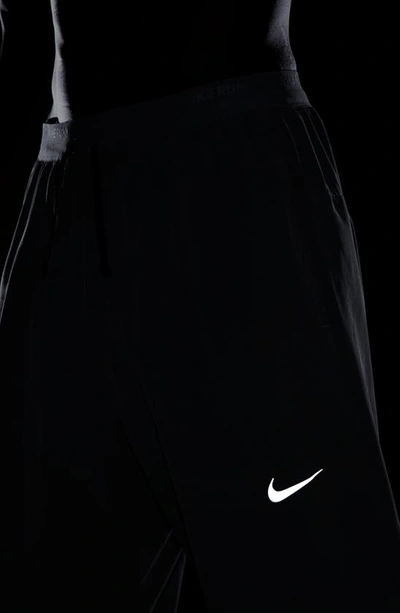 Shop Nike Dri-fit Phenom Woven Running Pants In Smoke Grey/ Reflective Silver