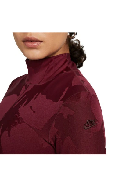 Shop Nike Dri-fit Mock Neck Long Sleeve Jacquard Bodysuit In Dark Beetroot/ Burgundy Crush