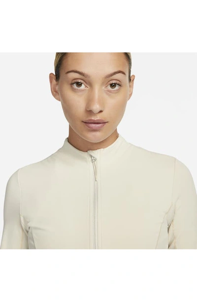 Shop Nike Yoga Dri-fit Luxe Fitted Jacket In Light Orewood Brown