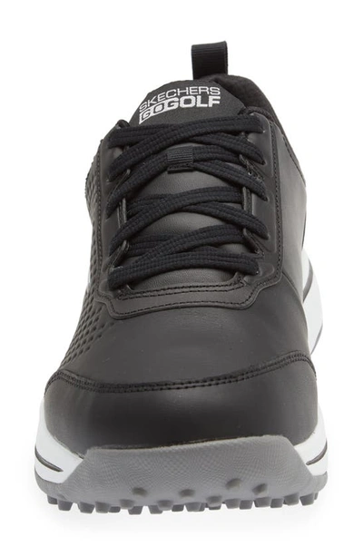 Shop Skechers Go Golf Arch Fit Set Up Waterproof Spikeless Golf Shoe In Black/ White
