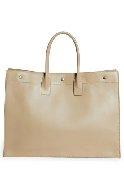 Shop Saint Laurent Large Rive Gauche Leather Tote In Sea Salt