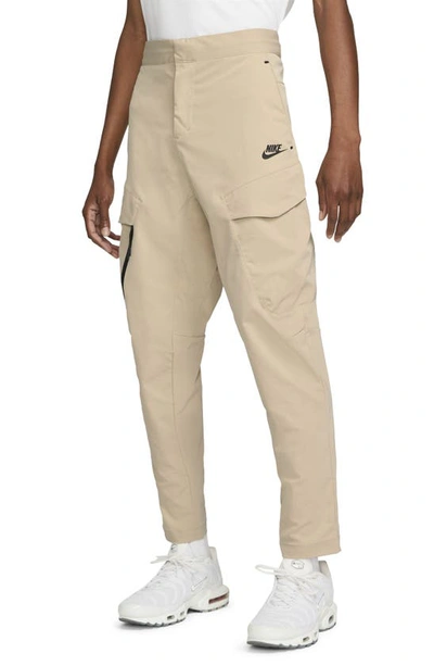 Shop Nike Sportswear Tech Essential Cargo Pants In Sanddrift/ Black