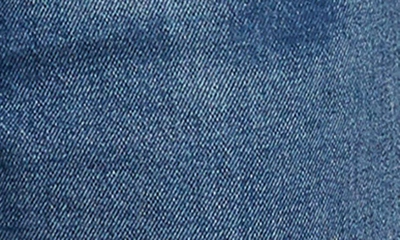 Shop Good American Good '90s Cutoff Denim Shorts In Blue645