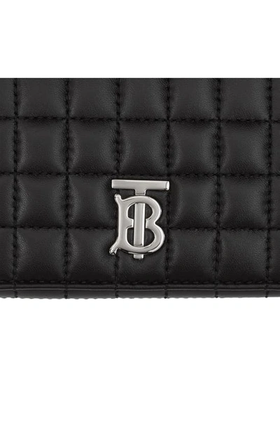Shop Burberry Lola Quilted Leather Trifold Wallet In Black / Palladio