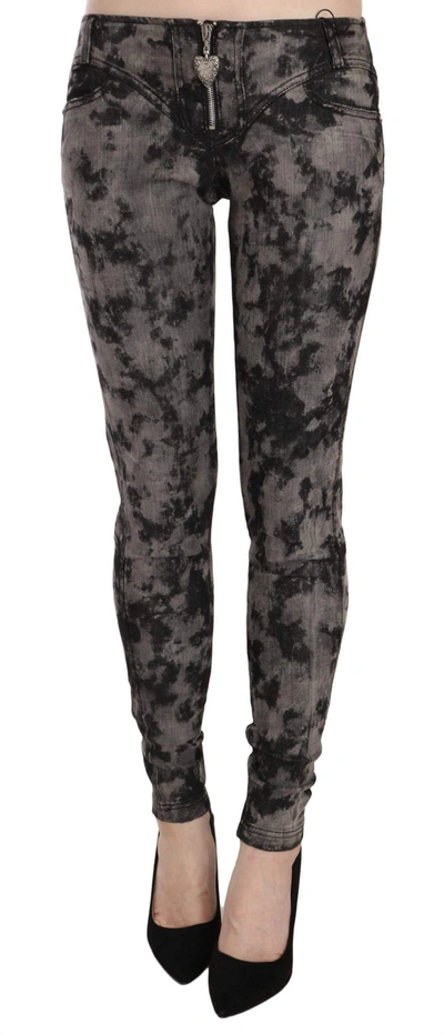 Shop Just Cavalli Faded Low Waist Skinny Denim Trousers Jeans In Multicolor