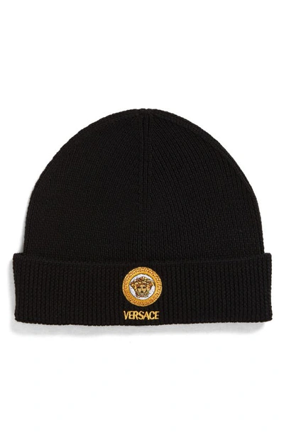 Shop Versace Biggie Coin Embroidered Logo Rib Wool Beanie In Black/ Gold