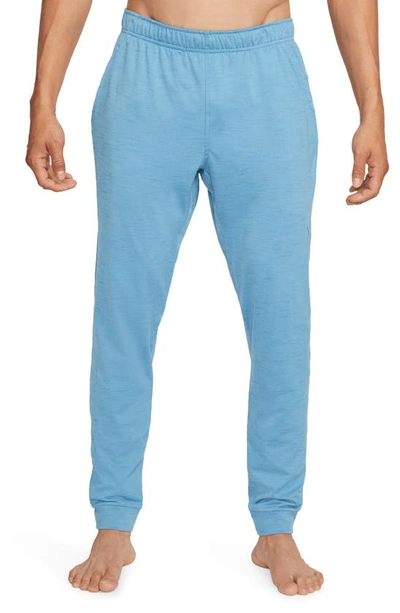 Shop Nike Pocket Yoga Pants In Worn Blue/ Dutch Blue