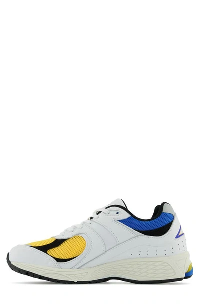 Shop New Balance 2002r Sneaker In White/ Vibrant Apricot