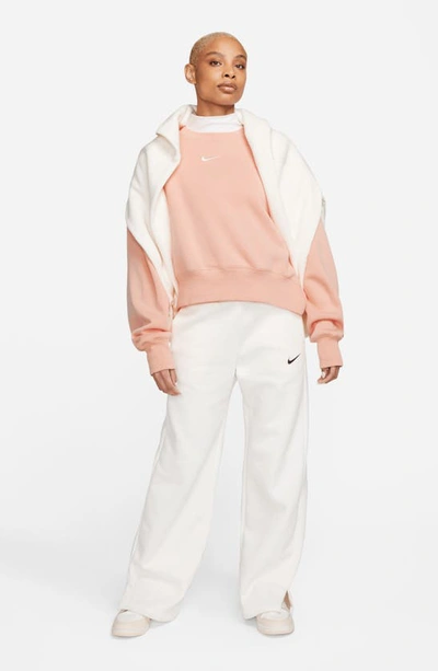 Shop Nike Phoenix Fleece Crewneck Sweatshirt In Arctic Orange/ Sail