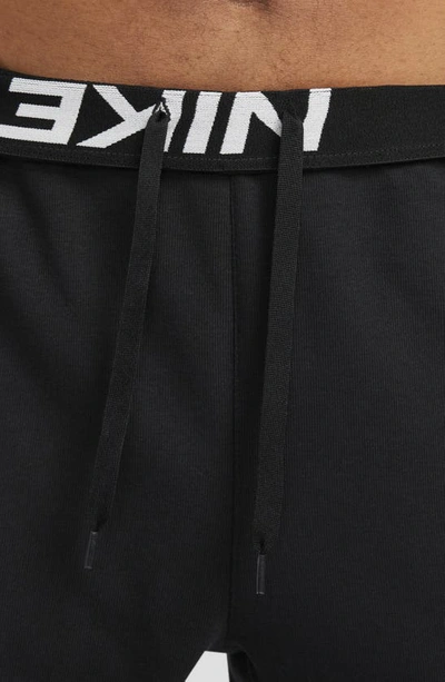Nike Men's Dri-fit Fleece Tapered Running Pants In Black | ModeSens