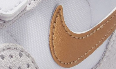 Shop Nike Md Valiant Sneaker In Grape/ Navy/ Metallic Copper