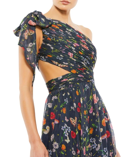 Shop Ieena For Mac Duggal Tied One Shoulder Cut-out Flowy Gown In Navy/multi