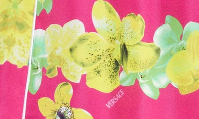 Shop Versace Orchid Print Silk Pajama Pants In Fuxia/ Multicolor