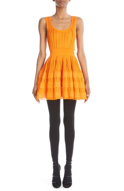 Shop Alaïa Mixed Stitch Sleeveless Skater Dress In Orange
