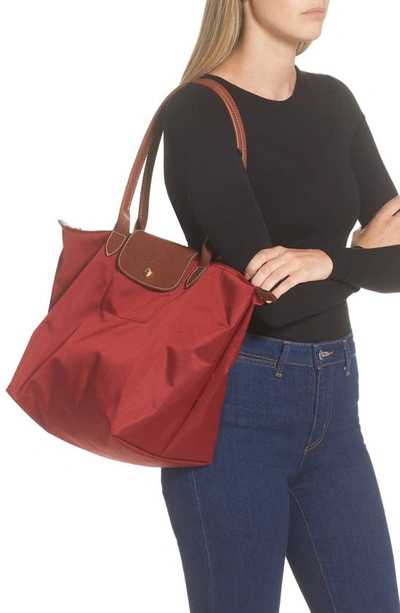 Shop Longchamp Large Le Pliage Tote In Red