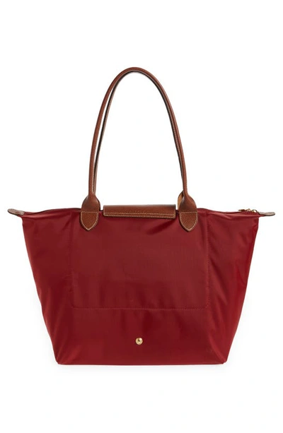 Shop Longchamp Large Le Pliage Tote In Red