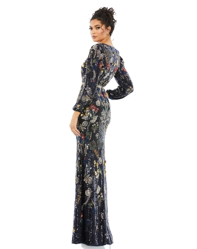 Shop Mac Duggal Embellished Wrap Over Bishop Sleeve Gown In Midnight Multi