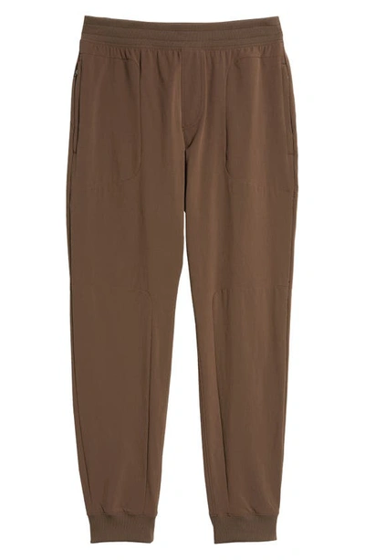 Shop Alo Yoga Co-op Pocket Tapered Joggers In Espresso